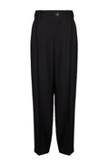 A pair of black relaxed pleat pants with an elastic waistband and sharp pleats, displayed against a white background.