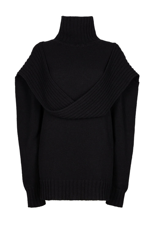 Elegant black chunky loop turtleneck sweater with a unique loop detail and snug ribbed cuffs for a sophisticated, cozy winter look