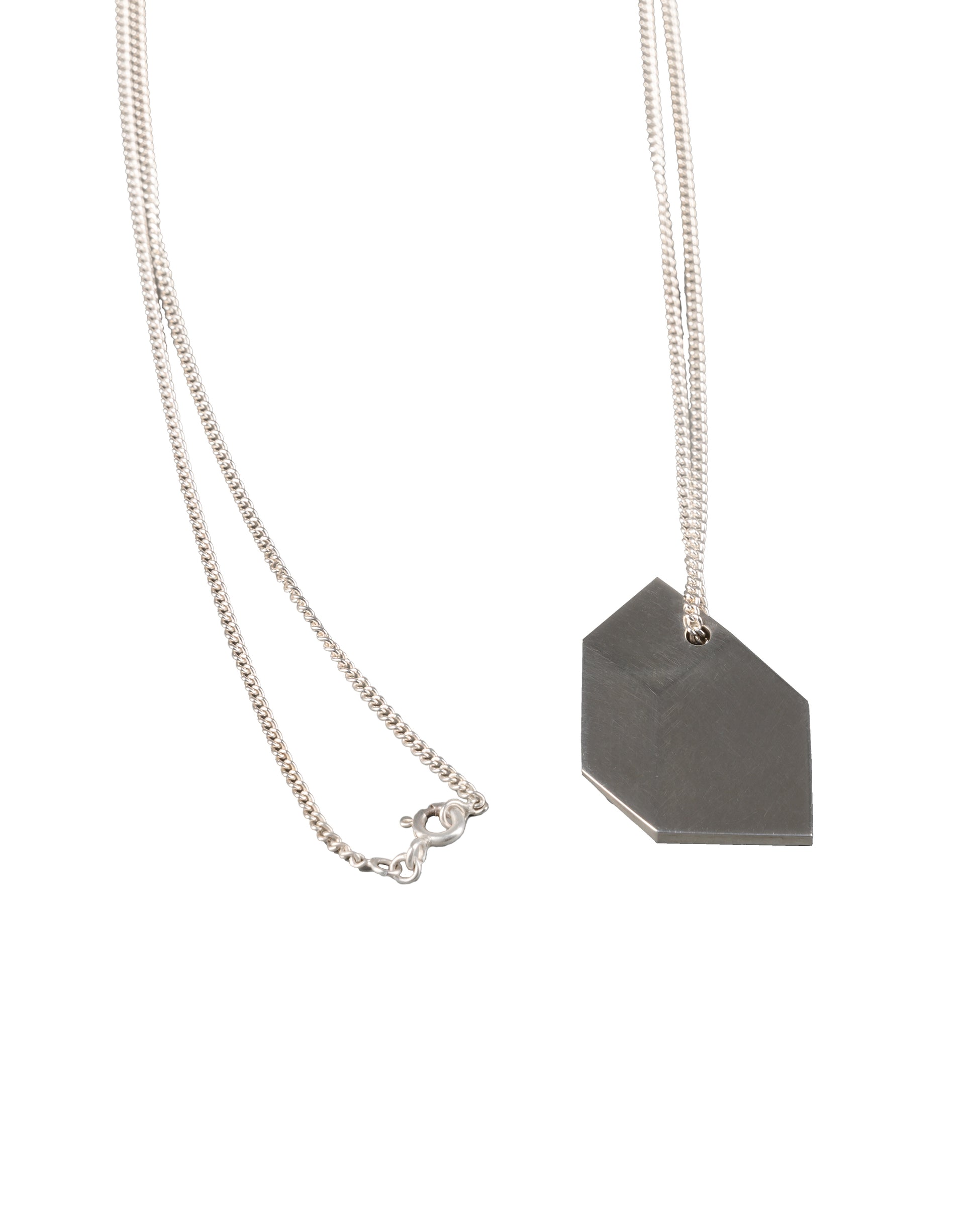 minimalist silver pendant necklace with a geometric design, ideal for adding a subtle, sophisticated sparkle to any look